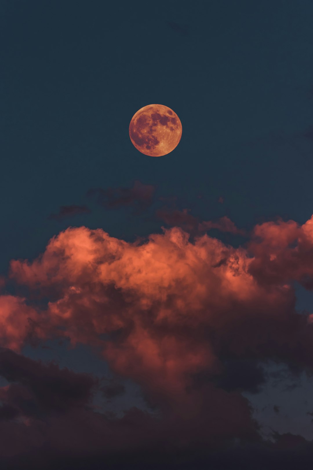 Bloody Moon by Hydrofoiling full moon and clouds