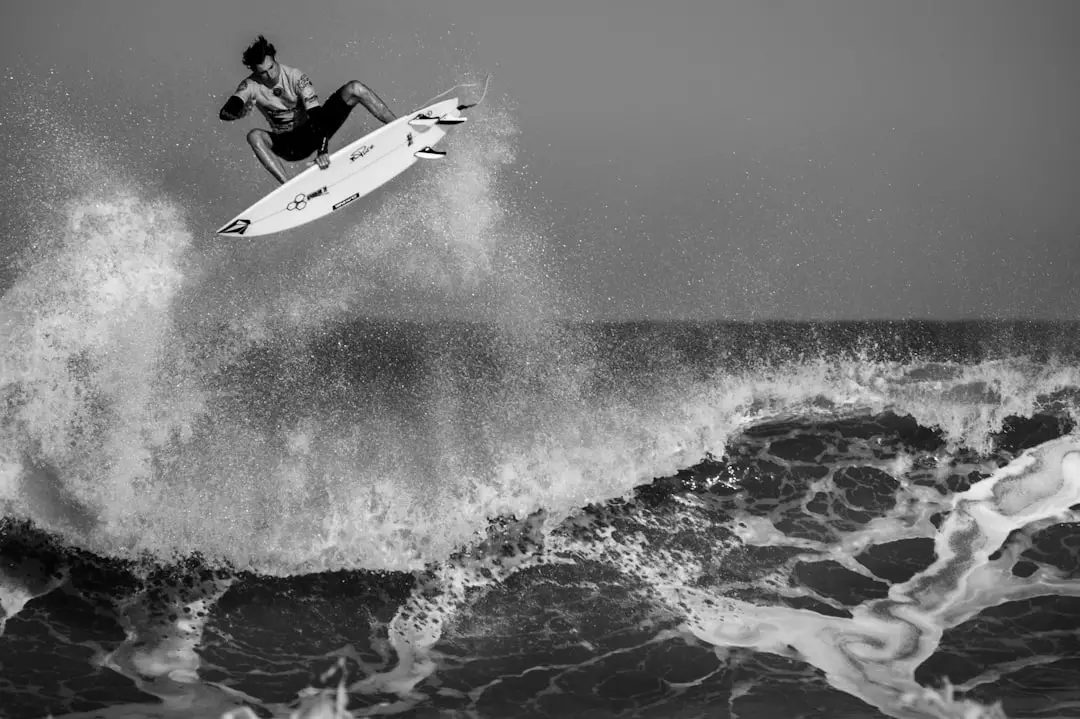 WSL - QS - Lacanau Pro 2018 by Hydrofoiling grayscale man surfing