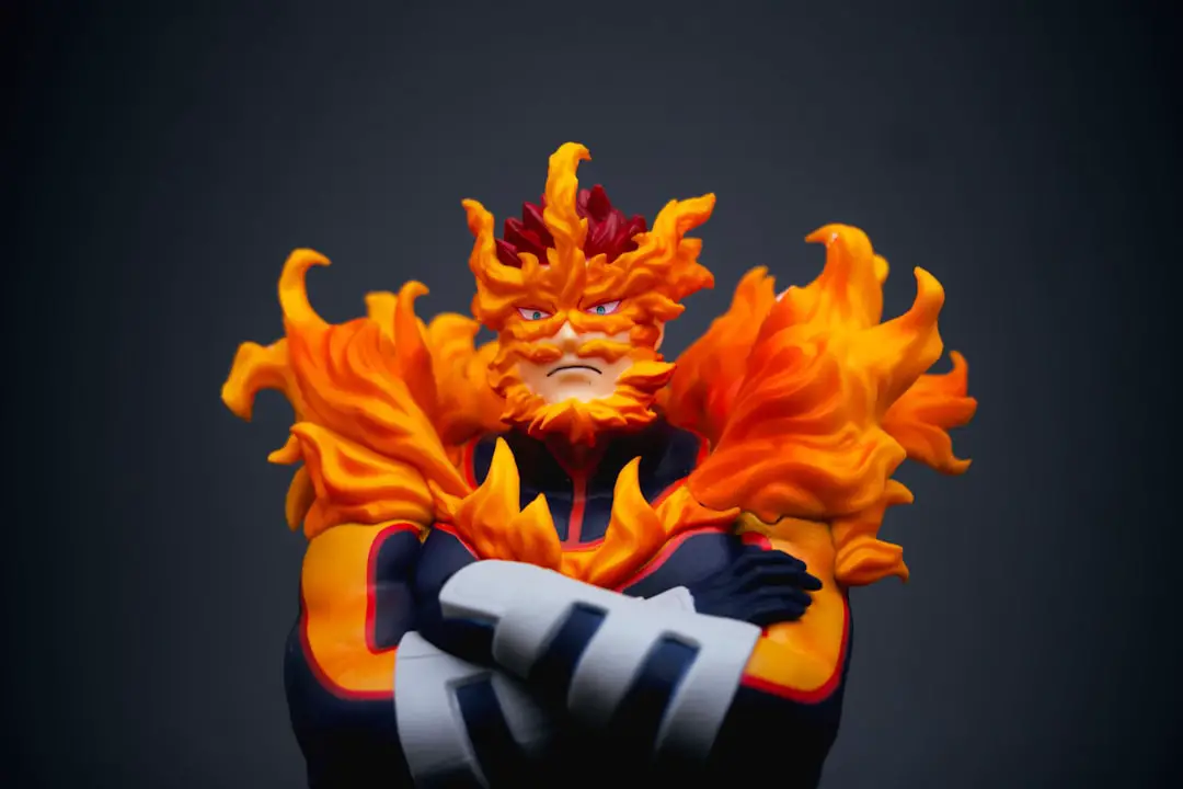 Endeavor action figure from My Hero Academia by Hydrofoiling a close up of a figurine of a person with fire on his face