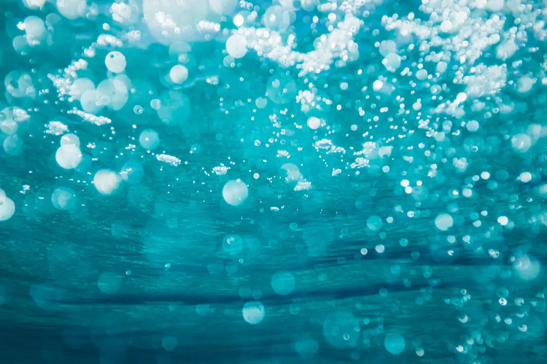 Under by Hydrofoiling underwater photography of water bubbles