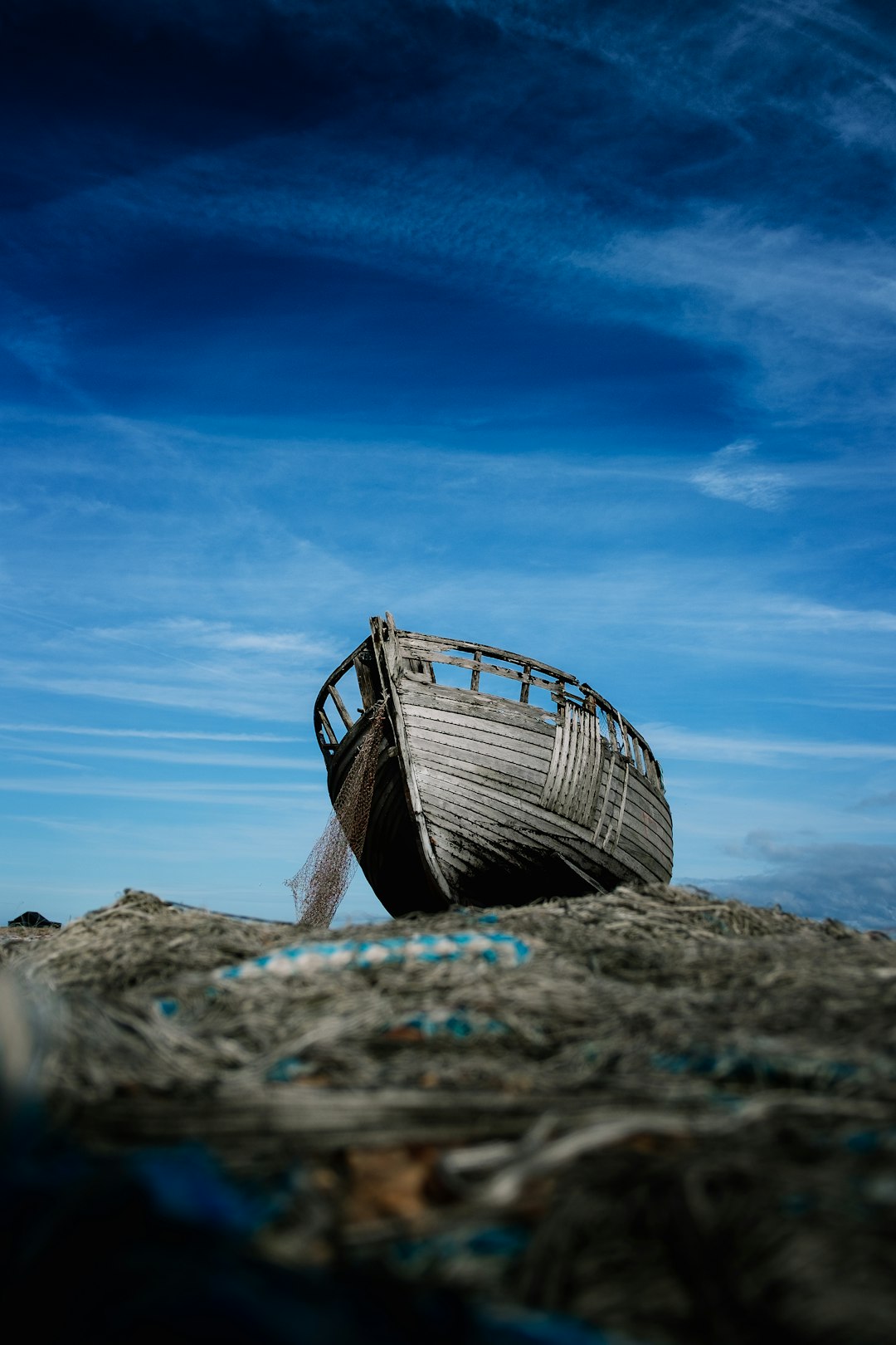 The Evolution of Hydrofoiling Behind Boats: A Brief History and Background by Hydrofoiling photo of of gray wooden ark on land under clear blue sky