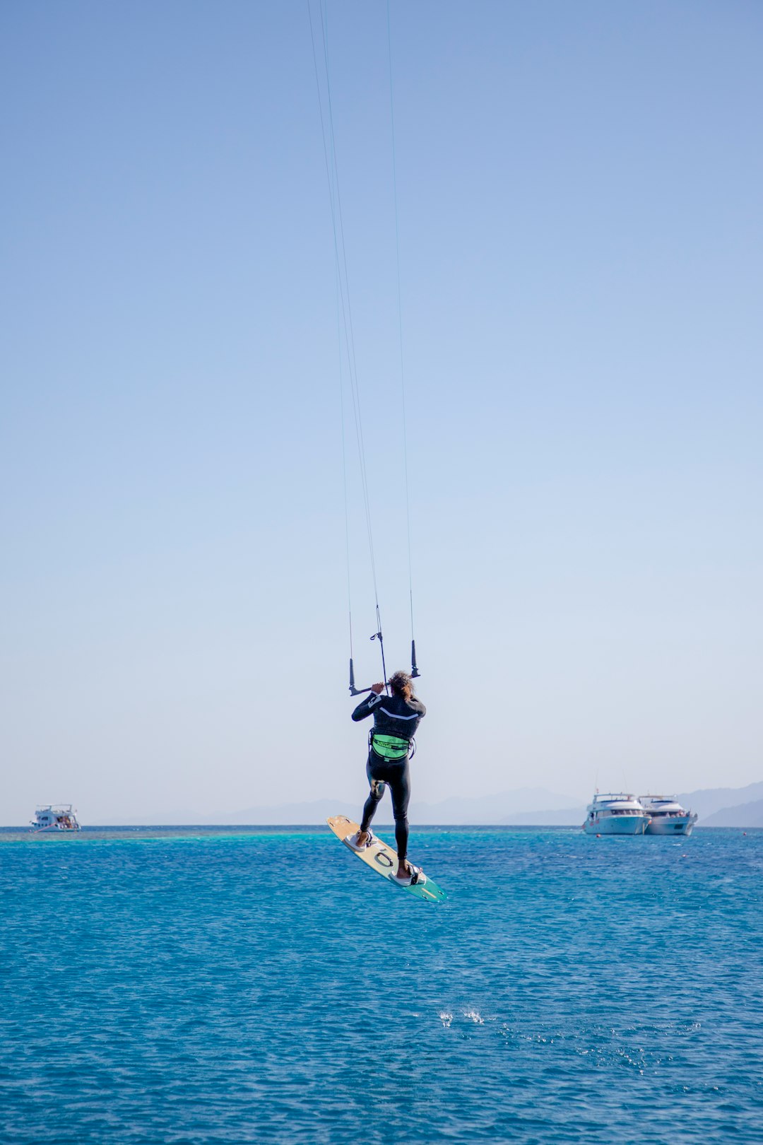 a man kite surfing in the sea