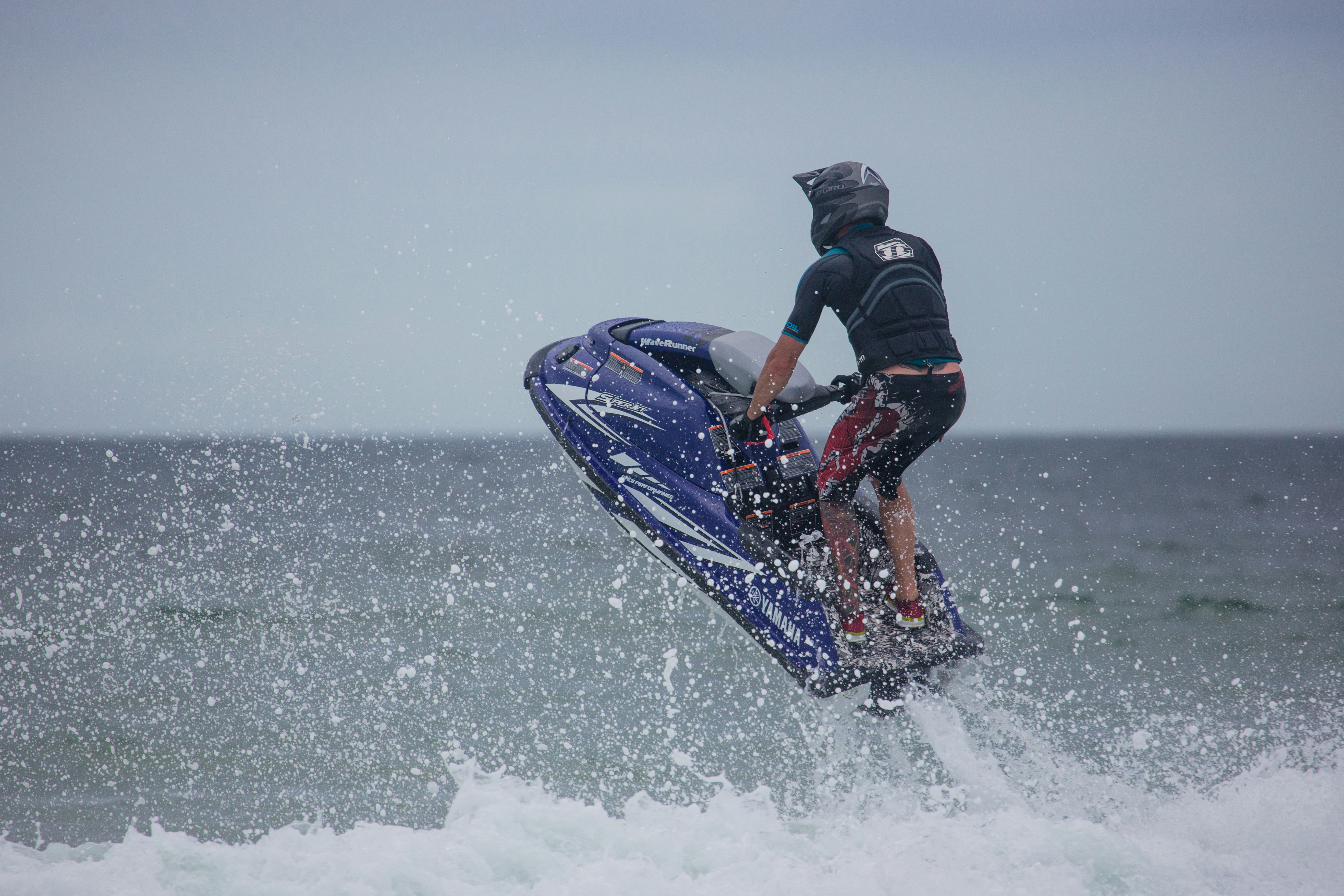 a man riding a jet ski in the ocean