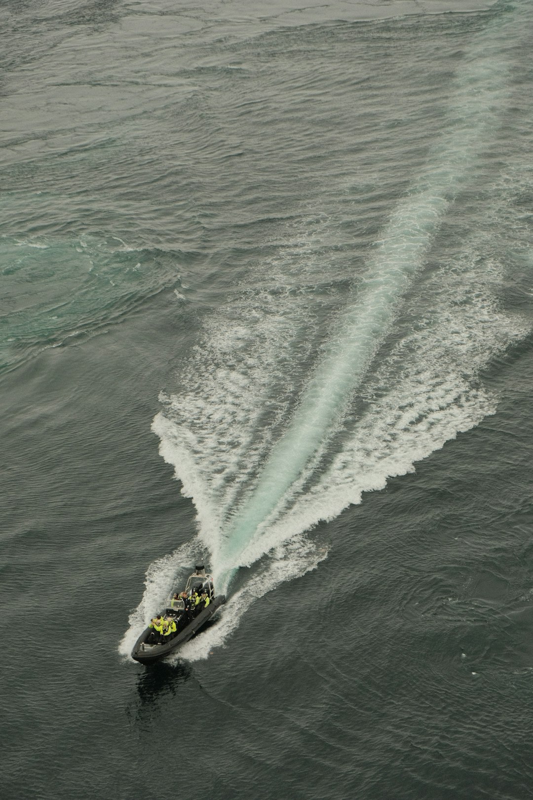 A couple of boats that are in the water